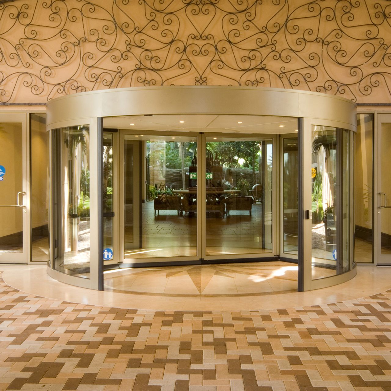 Elegant ASSA ABLOY revolving revolving door in the hotel entrance