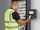 Man removing key from Traka key cabinet