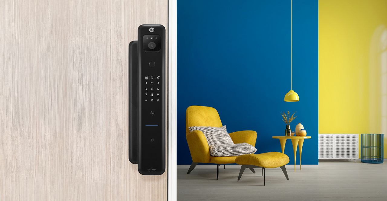 Modern smart lock installed on residential front door
