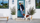 Man and pet dog with blue door