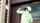 Man in hard hat inspecting door for damage