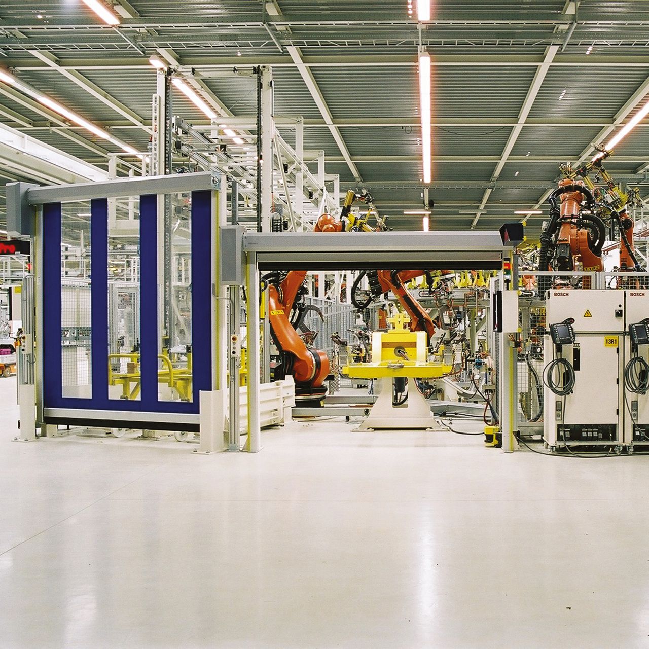 ASSA ABLOY Machine Protection Door acts as a guard in front of the robotic arm