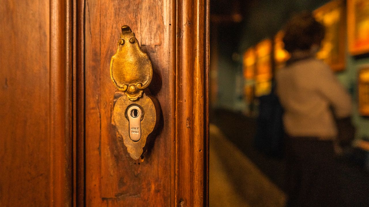 Old lock on a wooden door