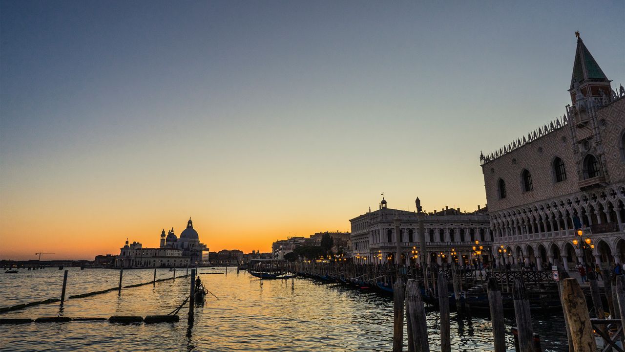 Colorful Venice city skyline on sunset