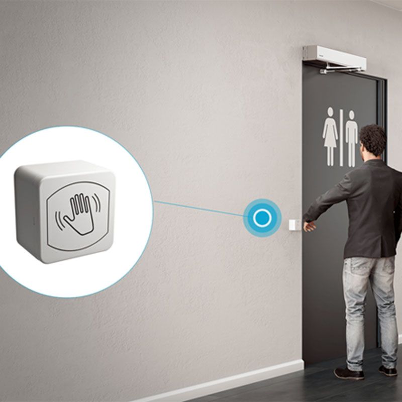 Illustration of person using the touchless switch.