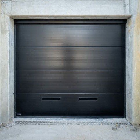 Garaże podziemne w budynku mieszkalnym z bramą I14-P dla klienta firmy Vermeiren