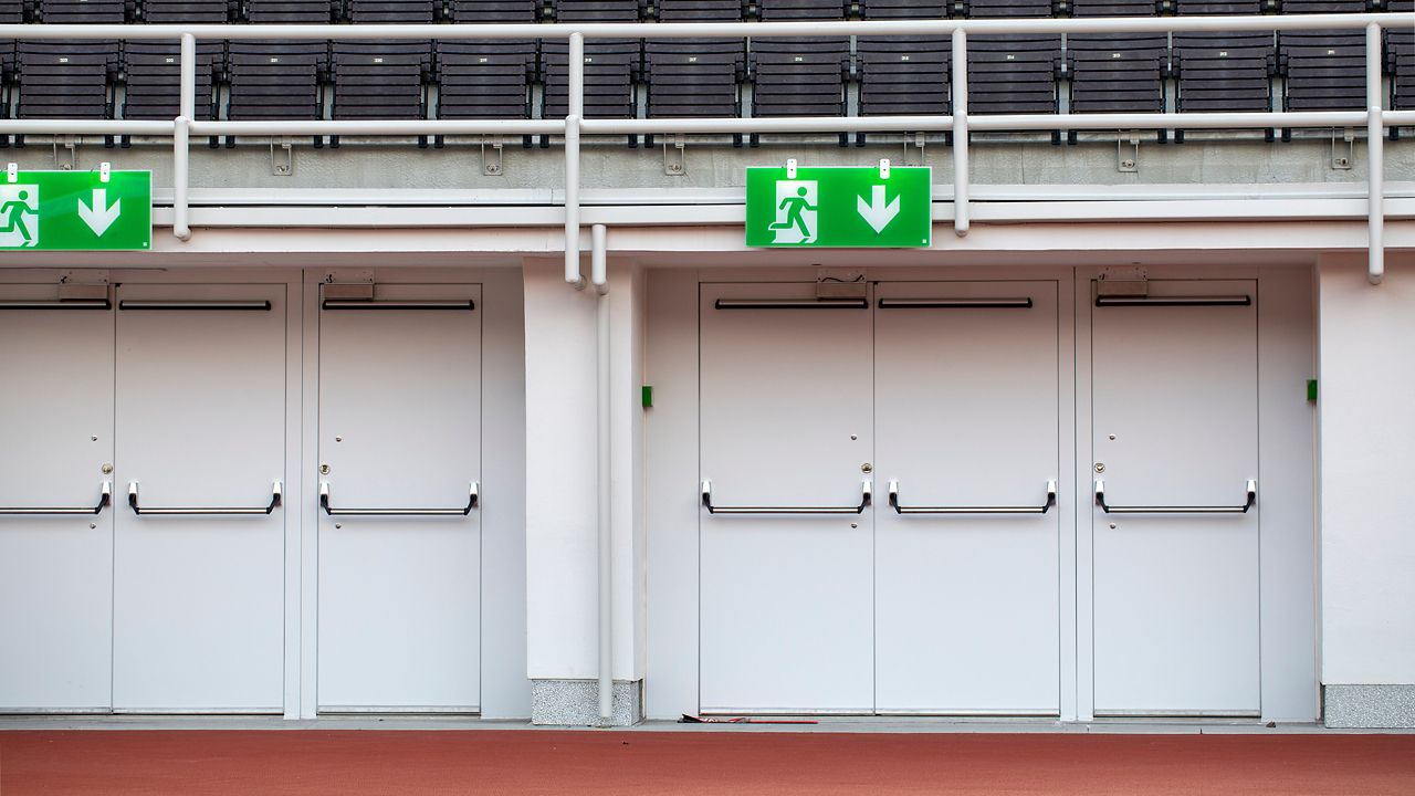 Emergency exit doors with ABLOY EXIT bars.