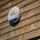 Yale Outdoor Siren grey on a house wall