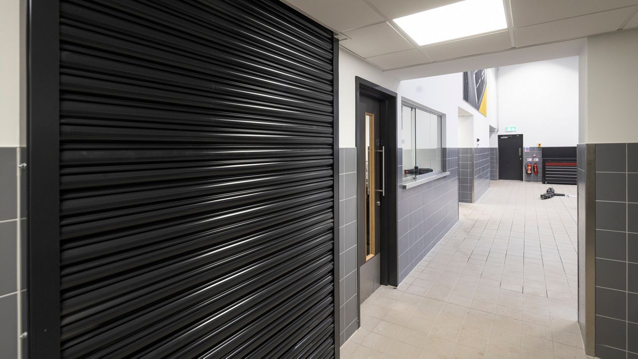 A fire rate roller shutter in the closed position installed in the parts centre at Porsche York