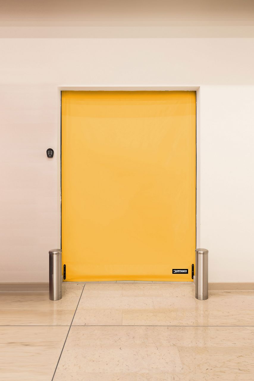 Yellow Dynaco door without windows. 