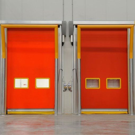 two red roller shutter doors in industrail warehouse