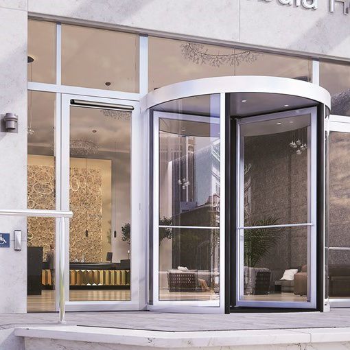glass revolving door at hotel entrance