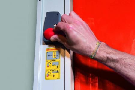 Emergency stop button on the Sector Plus door