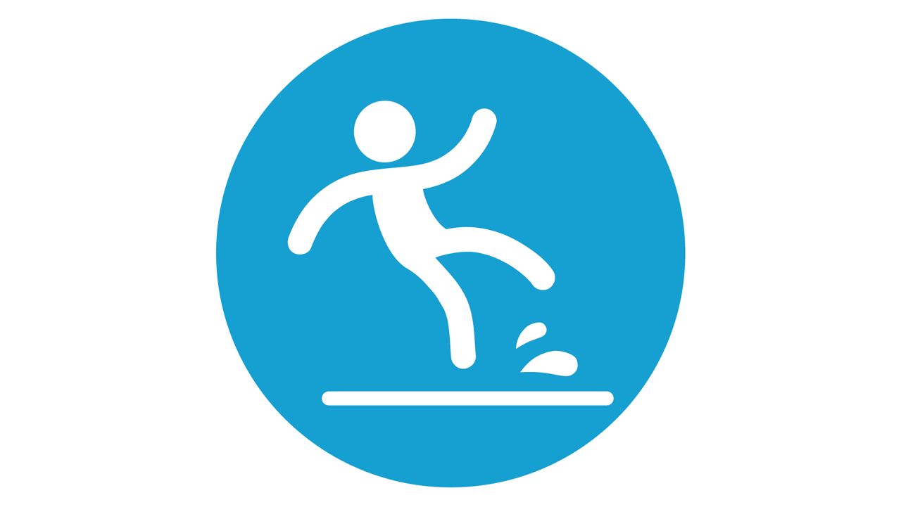 person slipping in a blue circle