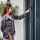 A girl using Yale Smart Keypad