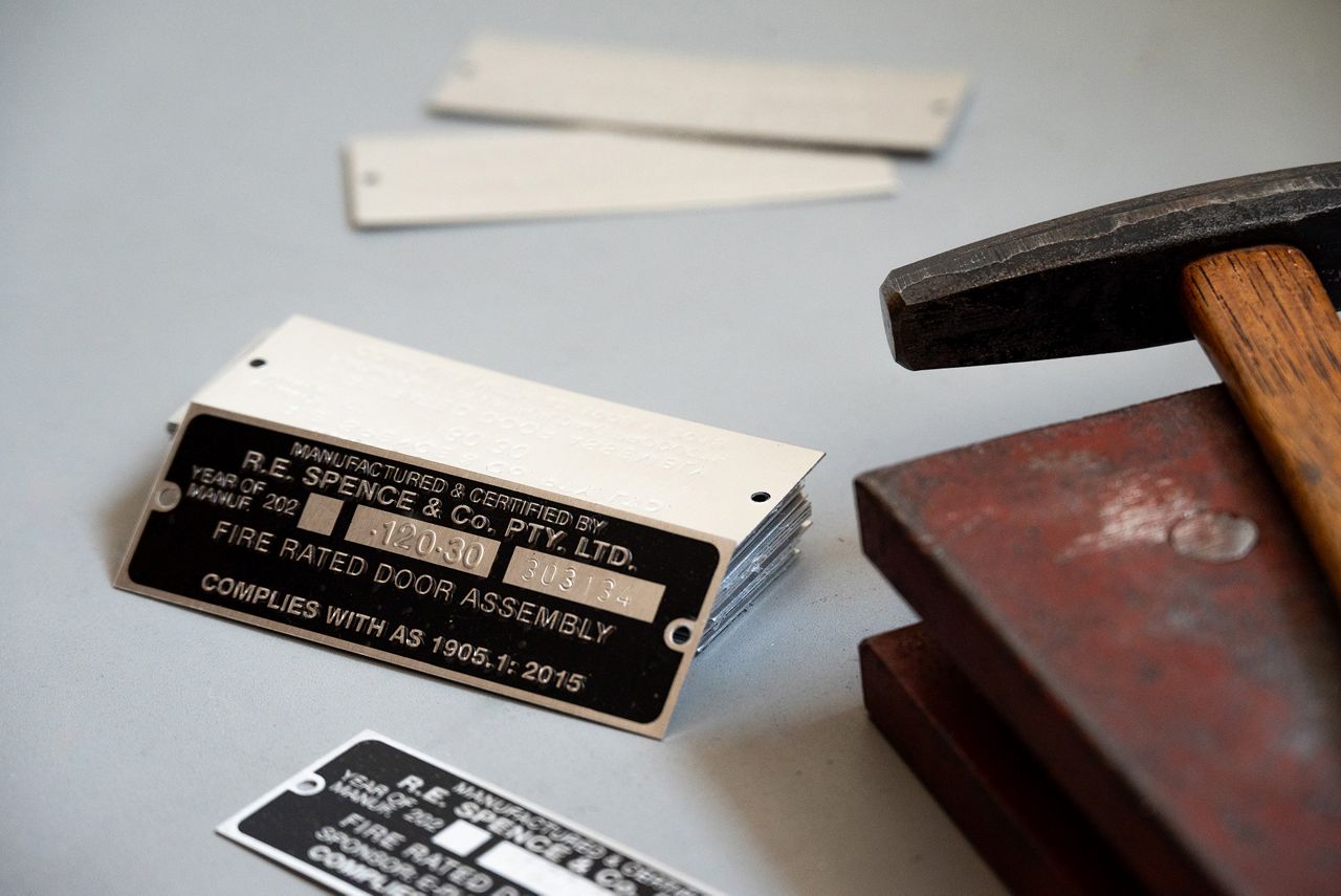 A Spence fire door tag for 2-hours of fire resistance