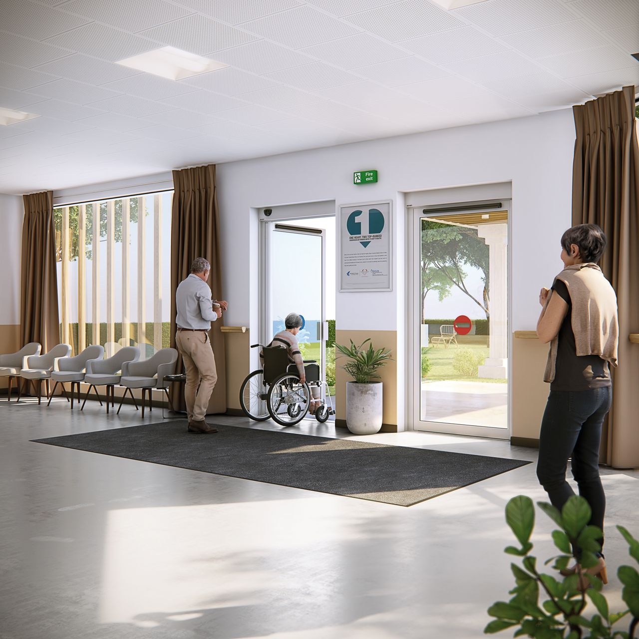 Woman in wheelchair going through an automatic swing door
