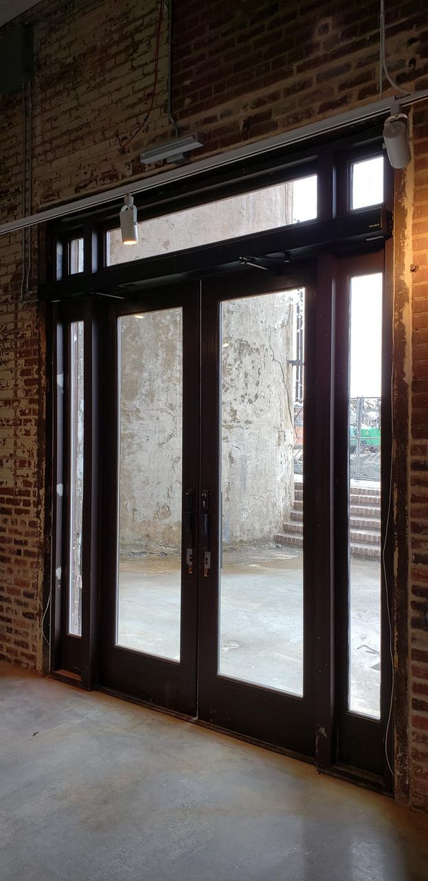 An automatic swing door installed at a luxury hotel