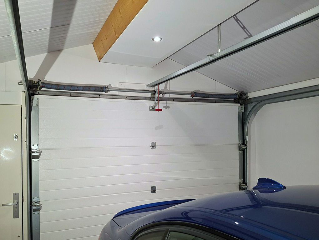 home garage door with bleu powder coated springs