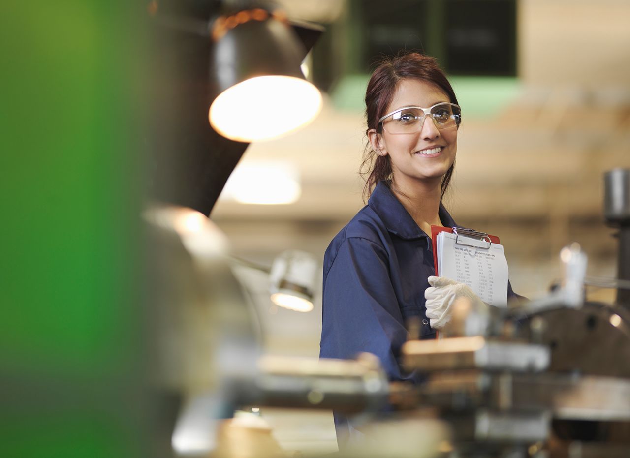 Woman working in a factory.