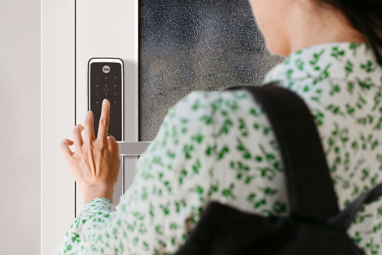 Woman pressing on keypad