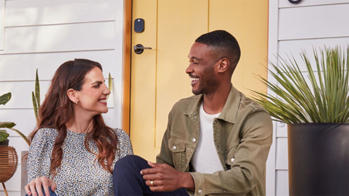 Man and woman in front of Yale door